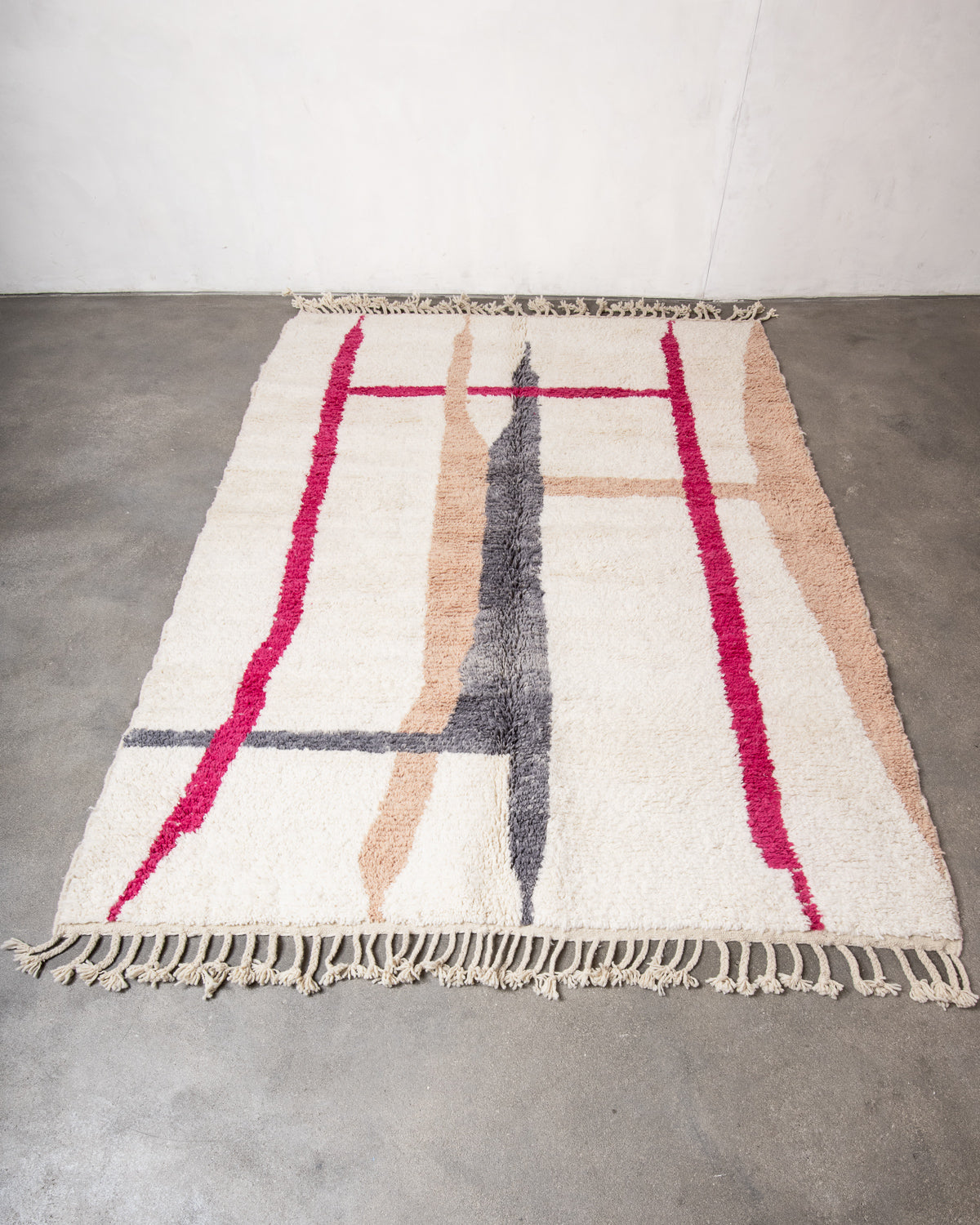 Modern, designer, handcrafted Berber rug from Morocco. Beniourain carpet with beautiful colours and patterns and fluffy wool texture.